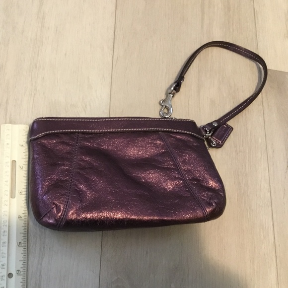 Coach Handbags - Coach purple metallic wristlet, with gray lining and silver colored accents